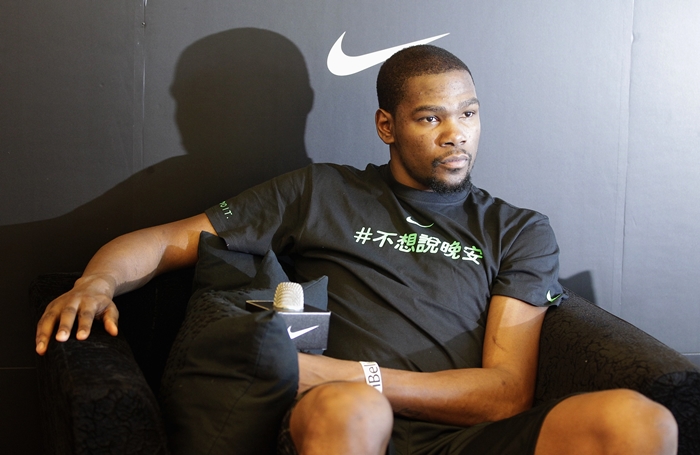 NBA basketball player Kevin Durant of the Oklahoma City Thunder looks on as he attends a news conference in Taipei