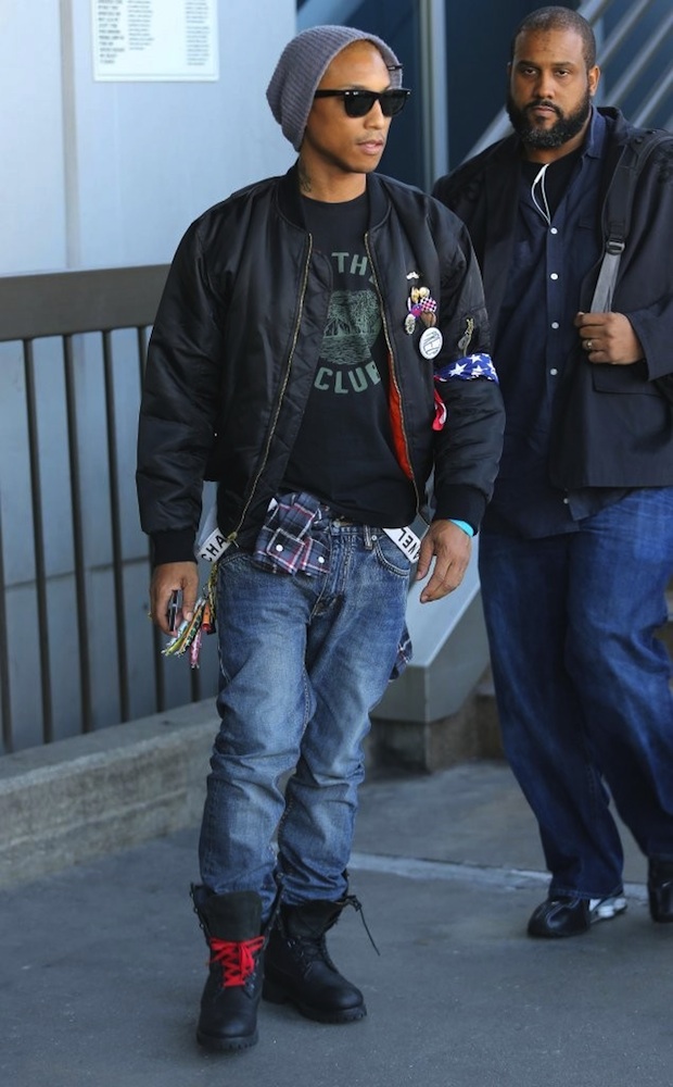 Pharrell-Williams-Ray-Ban-Sunglasses-black-flight-bomber-jacket-chanel-suspenders-Timberland-boots-3