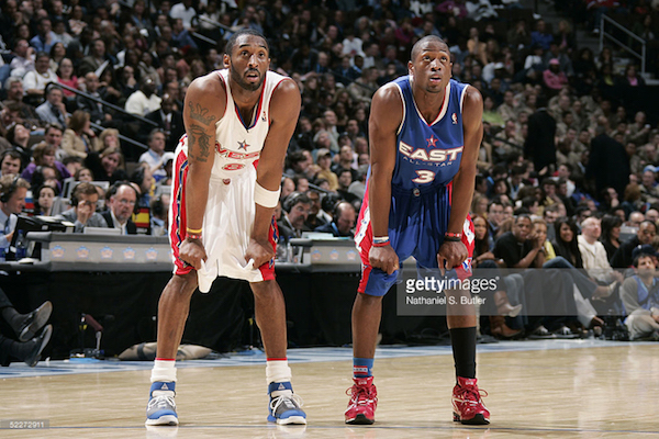 DENVER - FEBRUARY 20: Kobe Bryant #8 of the Western Conference All-Stars and Dwyane Wade #3 of the Eastern Conference All-Stars look on during the 54th All-Star Game, part of 2005 NBA All-Star Weekend at Pepsi Center on February 20, 2005 in Denver, Colorado. The East defeated the West 125-115. NOTE TO USER: User expressly acknowledges and agrees that, by downloading and or using this photograph, user is consenting to the terms and conditions of the Getty Images License Agreement. Mandatory copyright notice: Copyright NBAE 2005 (Photo by Nathaniel S. Butler/NBAE via Getty Images) *** Local Caption *** Kobe Bryant;Dwyane Wade