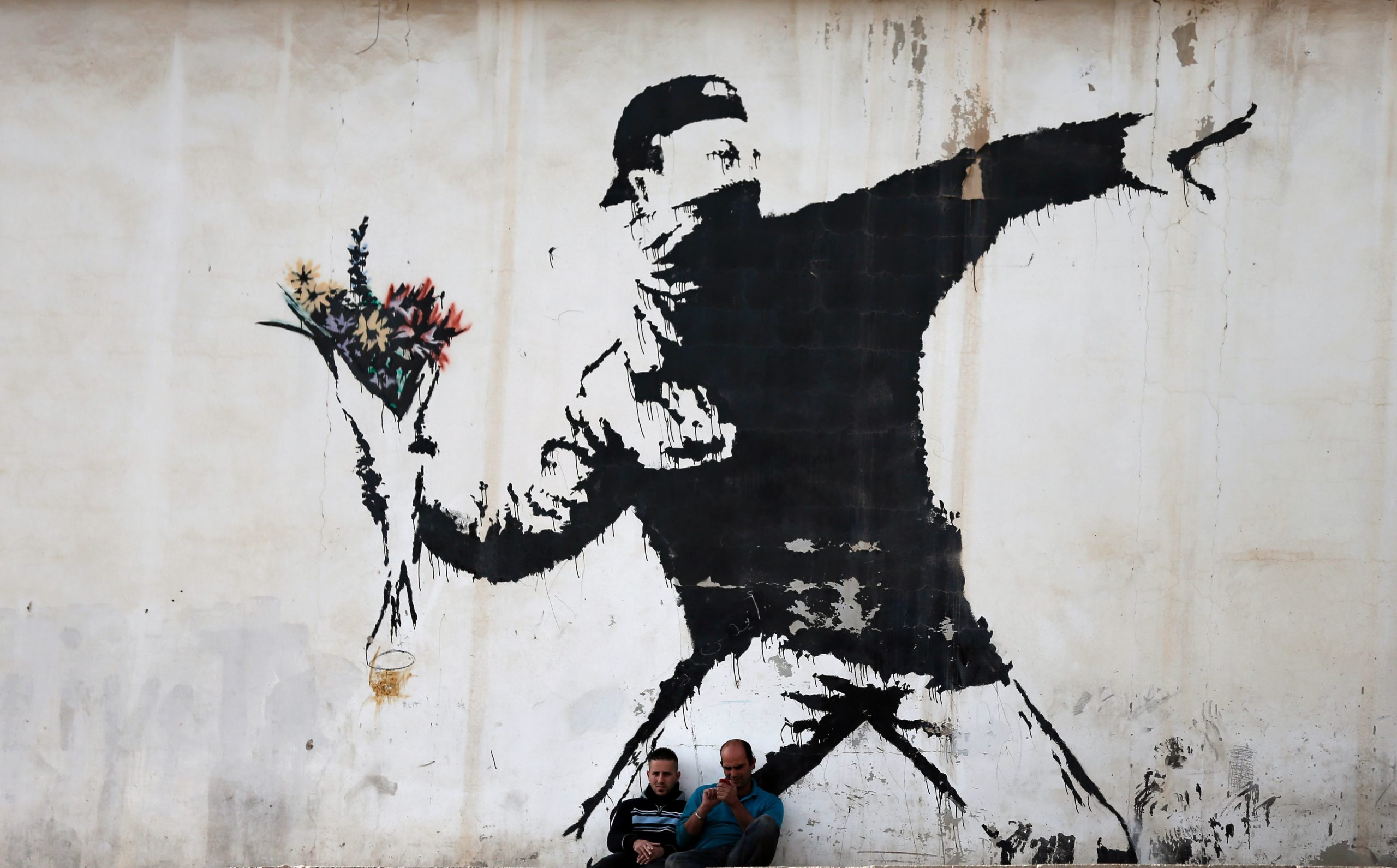 直接在你面前幹走... 塗鴉大師 Banksy 新作不到一小時就被偷！